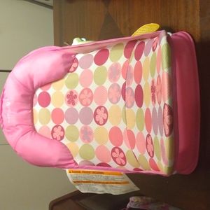 Bath seat for baby to sit inside the tub